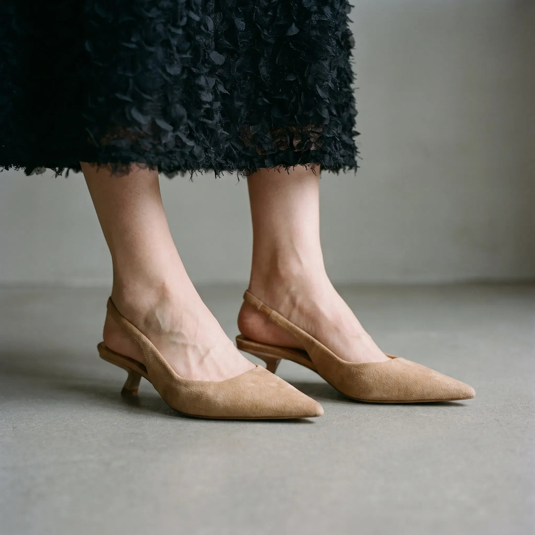 Women's elegant pointed-toe kitten heel slingback sandals, perfect for versatile summer or office wear.