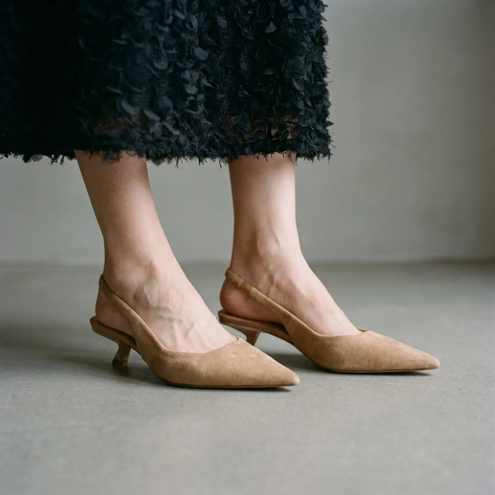 Women's elegant pointed-toe kitten heel slingback sandals, perfect for versatile summer or office wear.