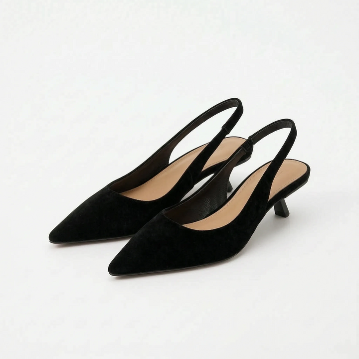 Women's chic pointed-toe kitten heel slingback sandals, a versatile and comfortable summer footwear choice.