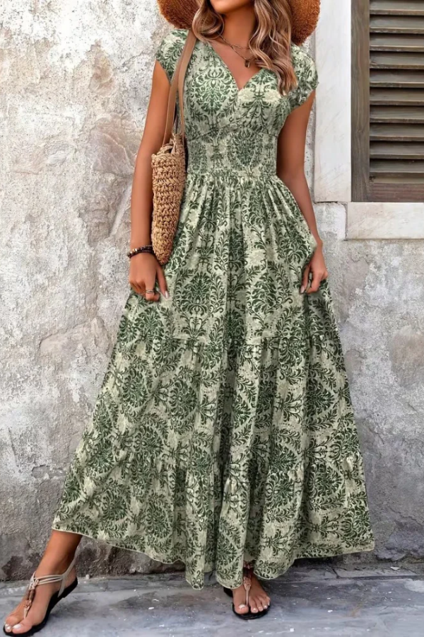 Casual women's printed V-neck maxi dress with an allover print. Comfortable and flowing for summer or vacation wear.
