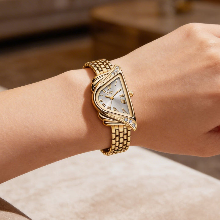 Silver women's elegant watch with a unique irregular rhombus dial. Chic water resistant fashion accessory.