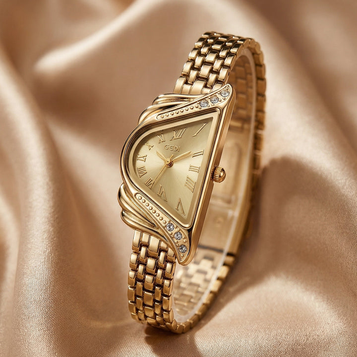 Elegant women's gold watch, irregular rhombus dial. Water resistant quartz timepiece, perfect fashion accessory.