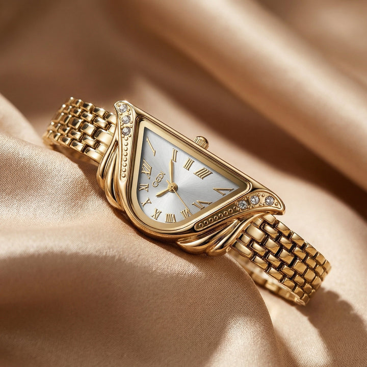 Women's gold tone quartz watch with an irregular rhombus dial. Elegant, water resistant fashion accessory.