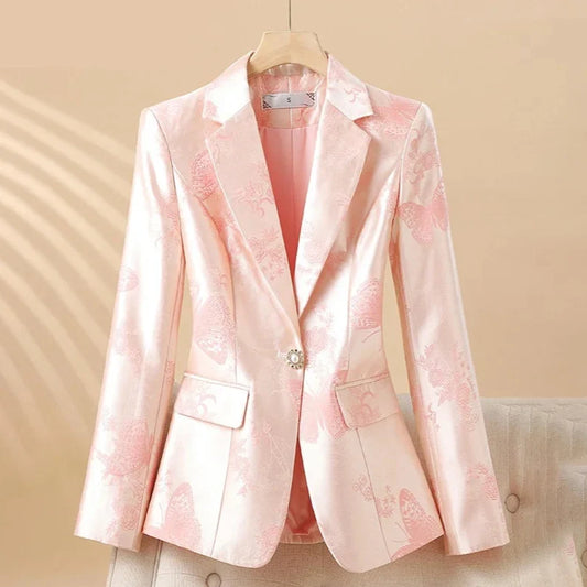 Women's elegant rosette blazer with sparkling jeweled button. Perfect for business casual or chic occasion wear.