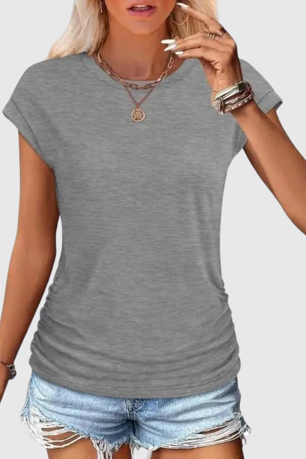 Women's elegant ruched side tunic top, perfect for casual everyday wear or vacation fashion. Comfortable loose fit blouse.