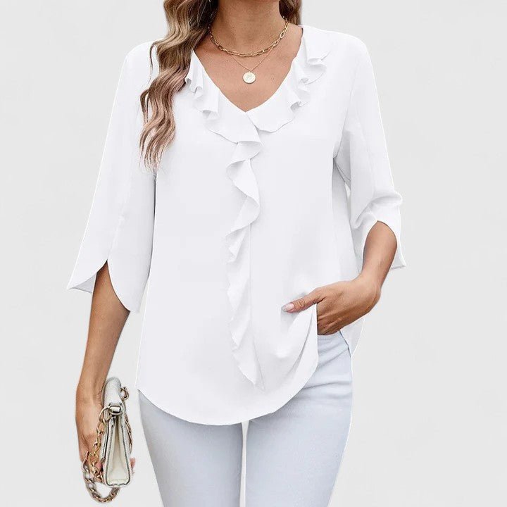 Relaxed fit women's V-neck blouse with ruffles and split sleeves, versatile for any occasion.