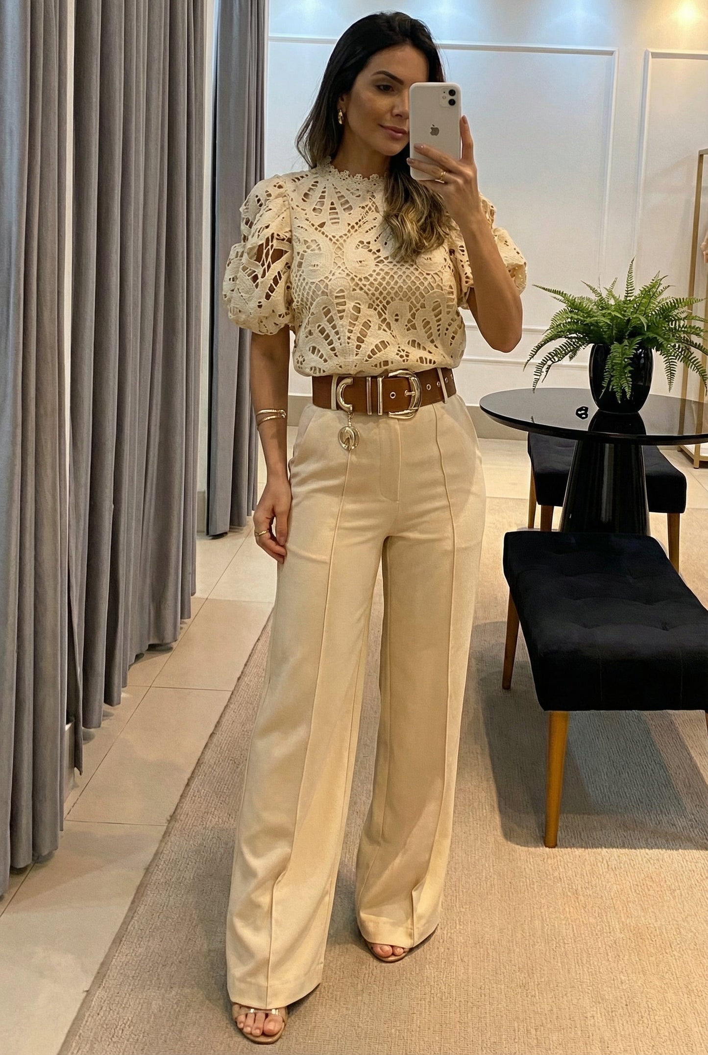 Sophisticated two-piece women's set with sheer blouse & tailored high-waist pants. Ideal for special occasions.