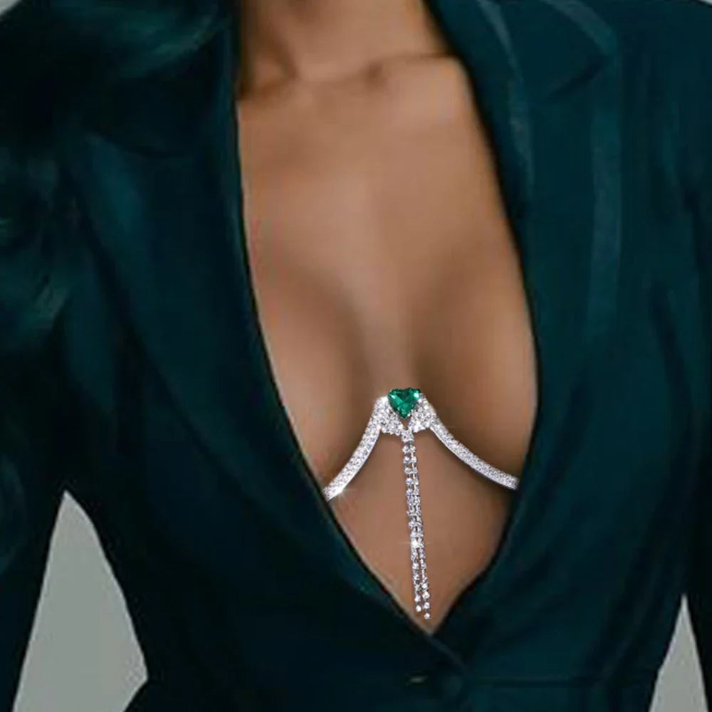 Women's elegant silver heart crystal chest chain necklace, a dazzling rhinestone body jewelry fashion accessory.