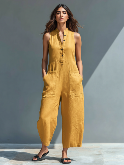 Polished women's sleeveless jumpsuit. Elegant & comfortable for versatile casual wear. Features mandarin collar.