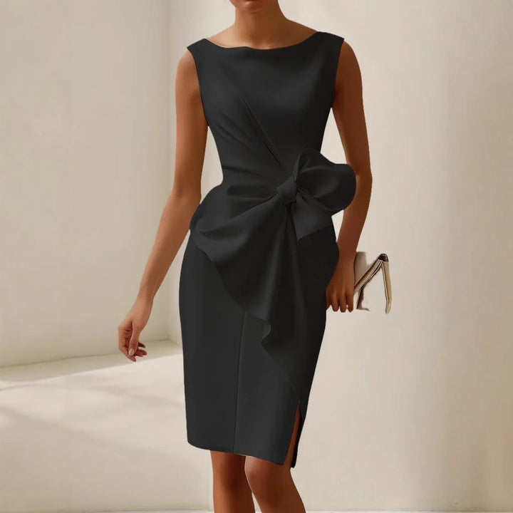 Stylish women's sleeveless mini dress with a defining waist tie. Versatile for cocktail events or parties.
