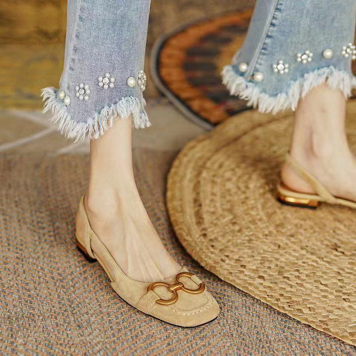 Elegant women's footwear: comfortable slingback flats designed for versatility.