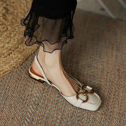 Stylish women's slingback flats, perfect for versatile daily and evening elegance.