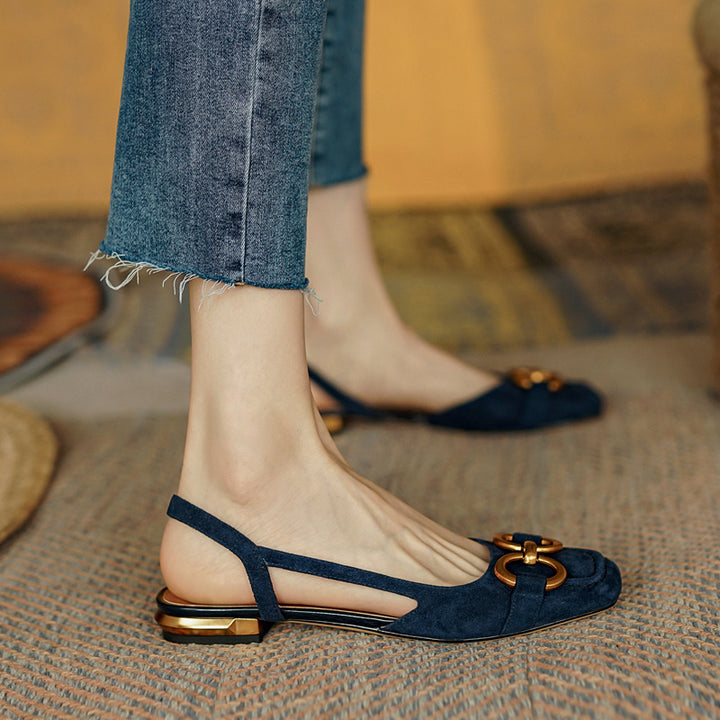 Comfortable women's slingback flats with a low heel, perfect for elegant day to night style.