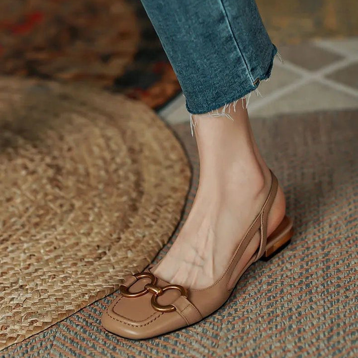 Sophisticated women's flats, with a slingback design for versatile all-day wear.