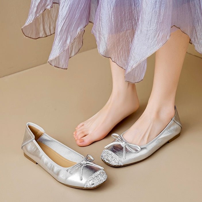 Chic silver glitter square toe ballet flats for women. Elegant comfort with a charming bow detail.