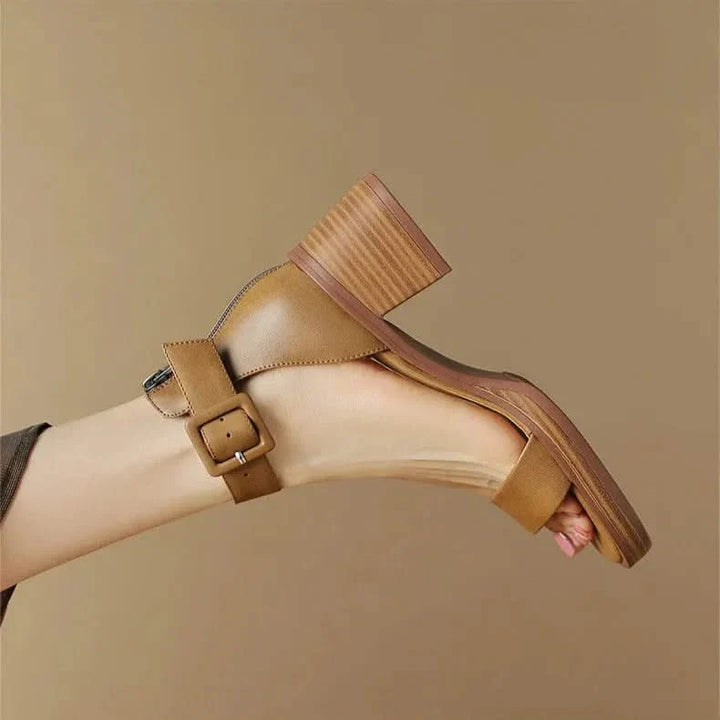 Sophisticated women's block heels with elegant strap, ideal dress shoes for classy events.