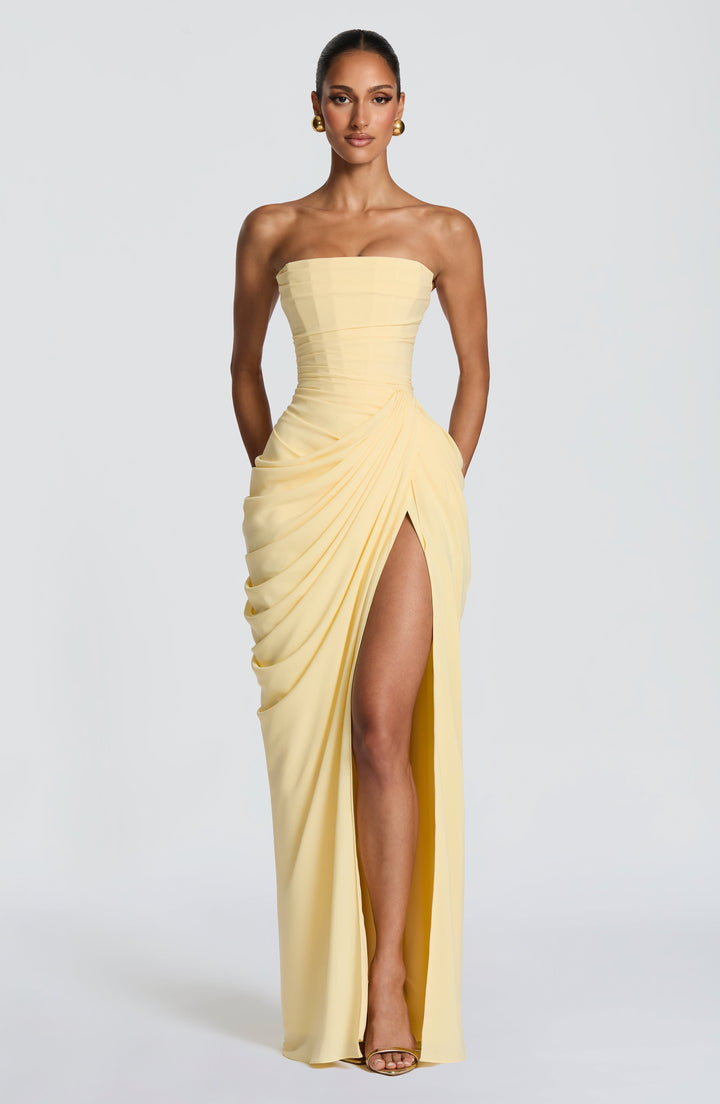 Women's elegant strapless maxi dress with corset bodice, perfect for formal evening or special occasions.