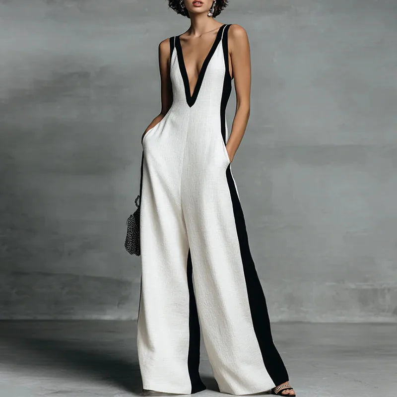 Women's elegant striped wide-leg jumpsuit with deep V-neck, perfect for summer vacation or brunch.