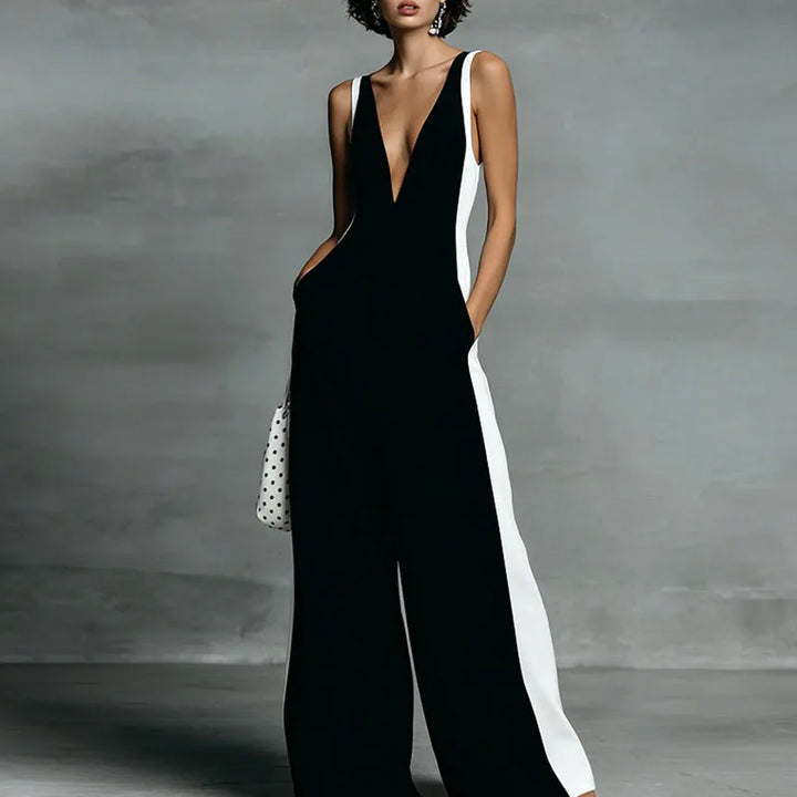 Women's versatile striped wide-leg jumpsuit, deep V-neck for an elegant, comfortable, and stylish outfit.
