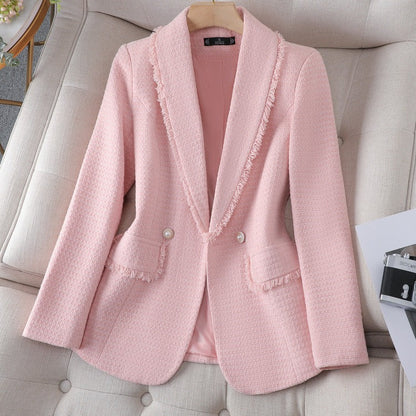 Chic women's structured blazer featuring luxurious pearl button details, ideal for sophisticated fashion.