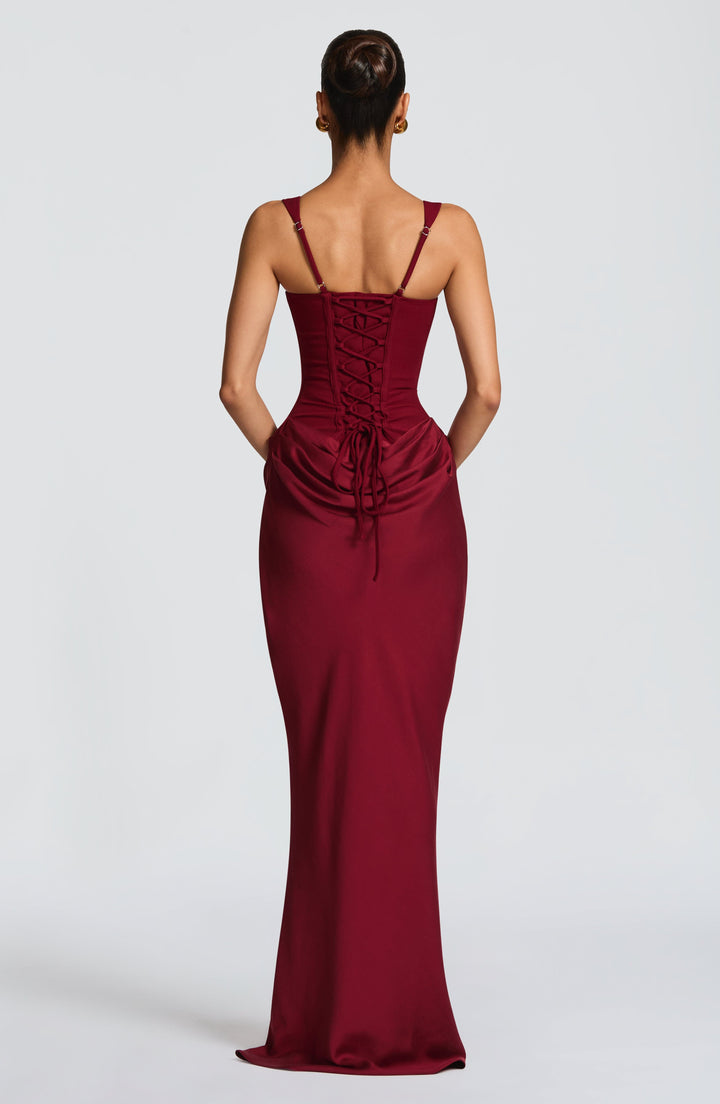 Sleeveless women's corset maxi dress, a chic and formal evening gown with a flowing, floor-length design.