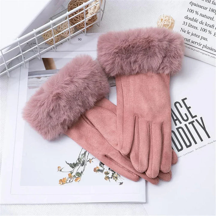 Women's elegant suede gloves with soft faux fur trim, perfect for winter.