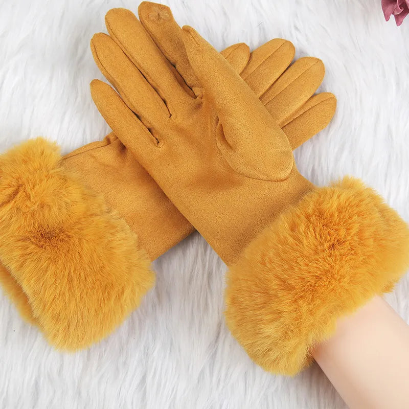 Must-have winter accessory: warm suede gloves for women with stylish faux fur trim.