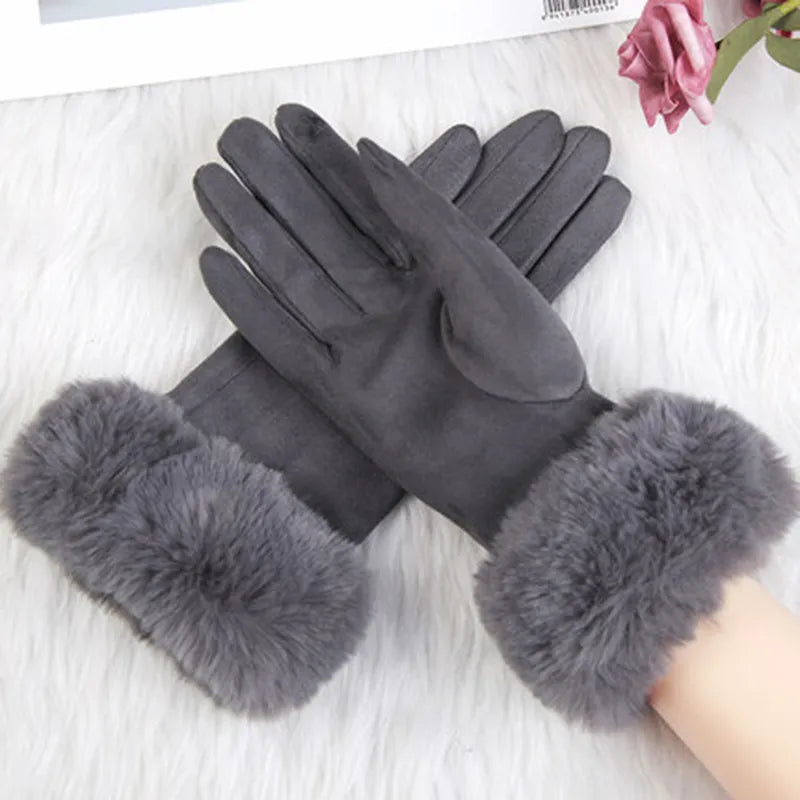 Elegant women's suede gloves, beautifully crafted with soft faux fur cuffs for style.