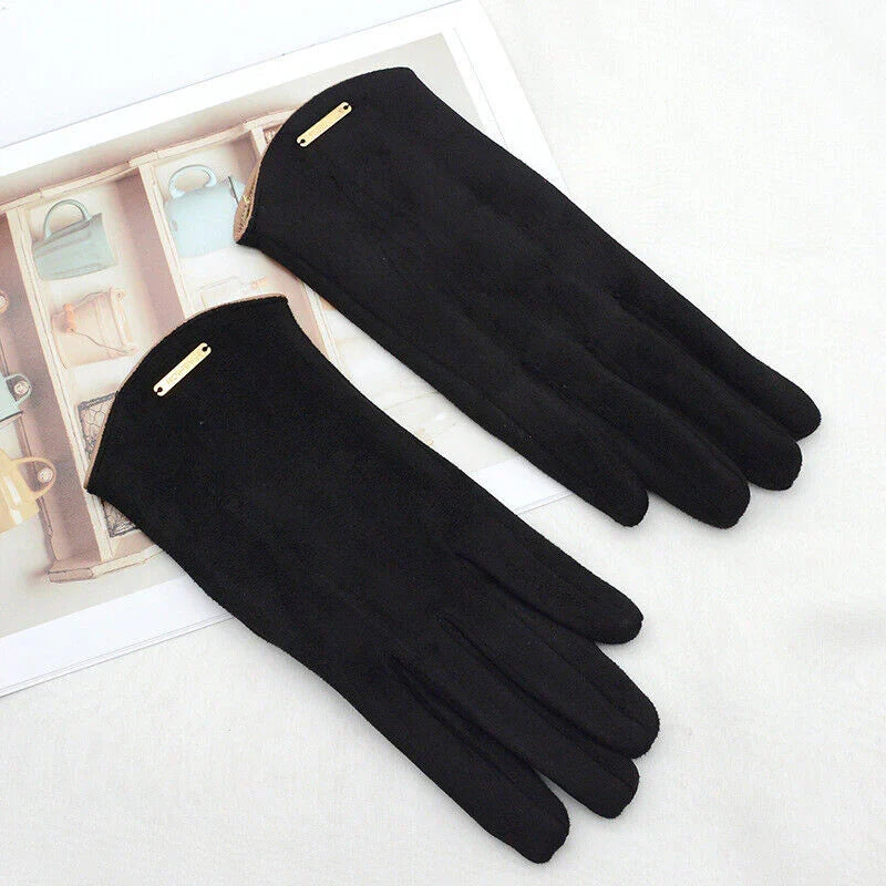 Stylish black suede gloves for women, featuring a warm cashmere lining & touchscreen fingertips.