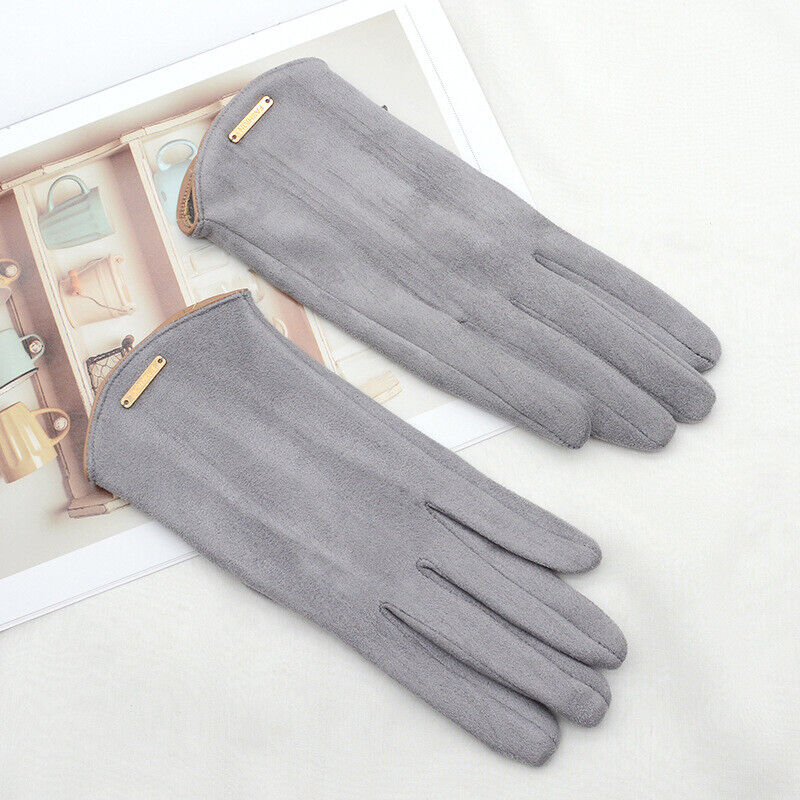 Comfortable beige women's cashmere-lined suede gloves, enabling touchscreen use in cold weather.