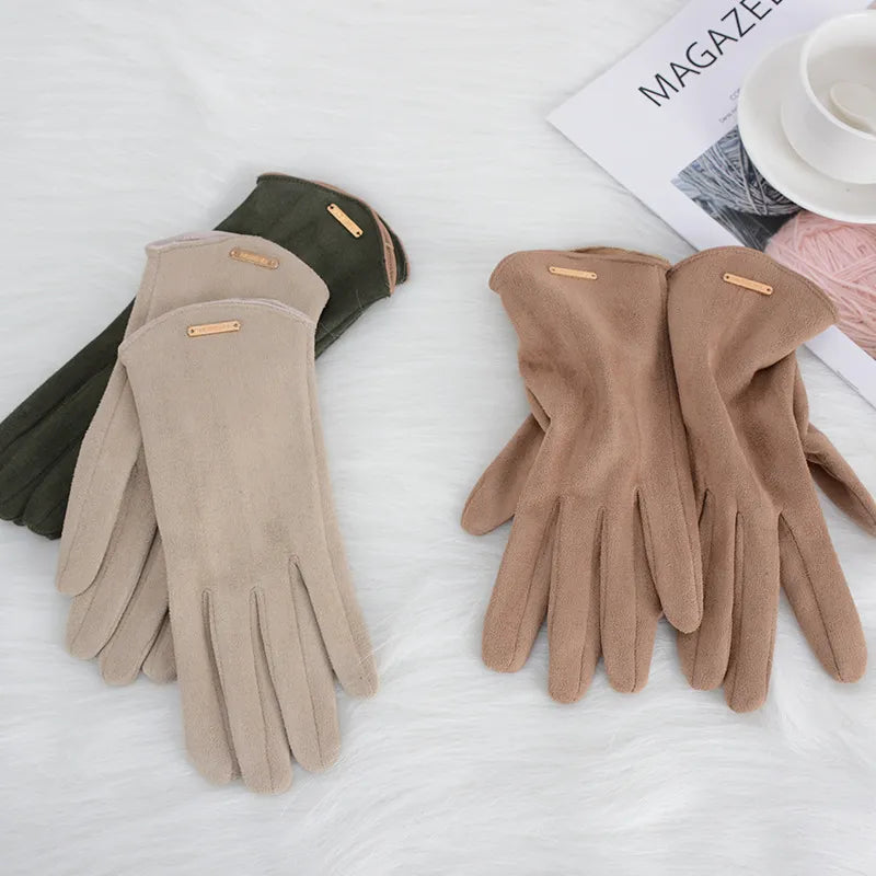 Black women's fashion suede gloves, touchscreen compatible with a cozy cashmere lining for winter.