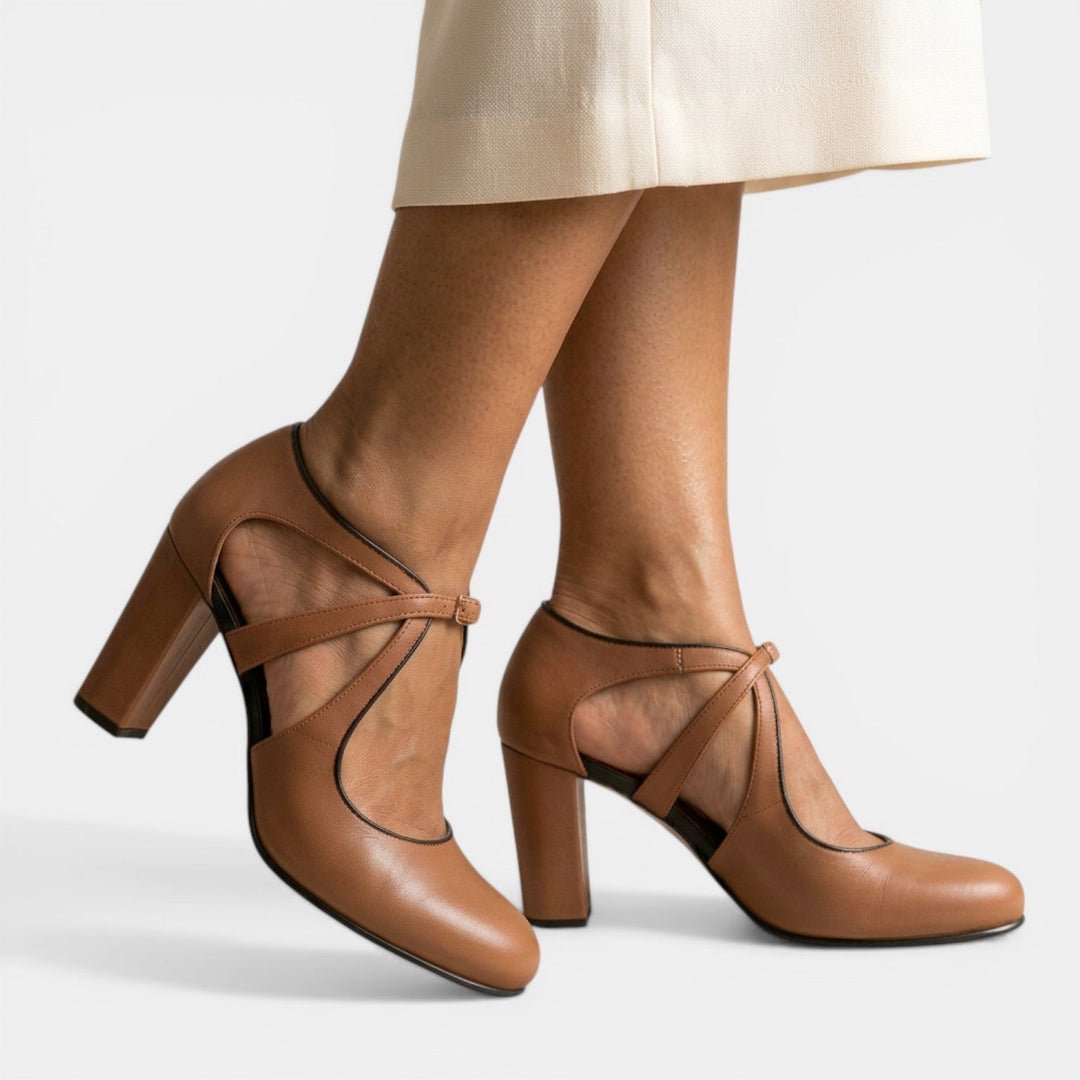 Women's elegant T-strap high heel sandals with round toe & buckle closure. Perfect formal evening wear footwear.