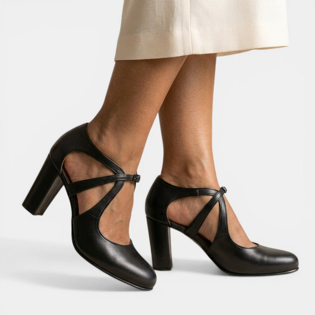 Stylish & comfortable women's T-strap high heel sandals, designed with a round toe and secure buckle for formal events.