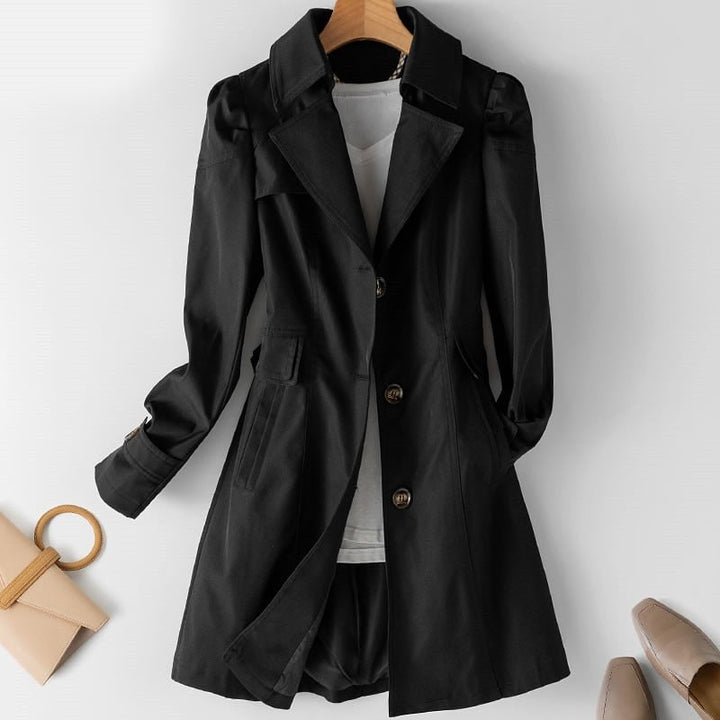 Chic women's tailored trenchcoat with a structured fit, offering sophisticated and elegant everyday outerwear.