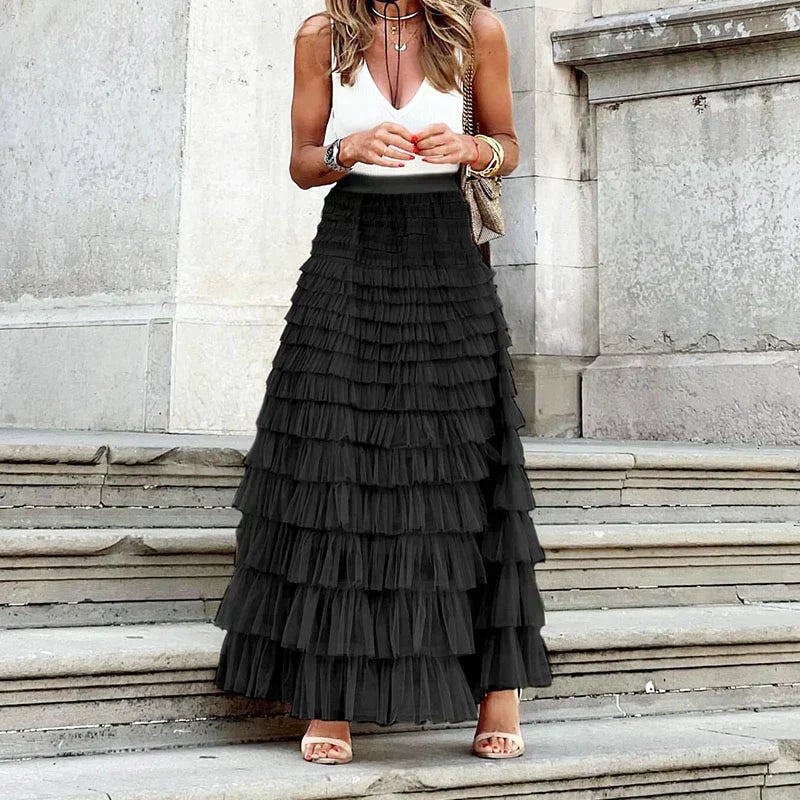 Elegant women's long tiered tulle skirt, voluminous ruffles, perfect for evening & formal events.