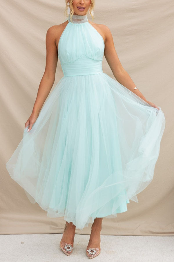 Gorgeous women's party midi dress featuring elegant tulle layers, ideal for special occasions.