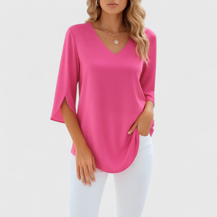 Sophisticated women's summer V-neck top with relaxed fit. Elegant & casual chic for ladies' apparel.