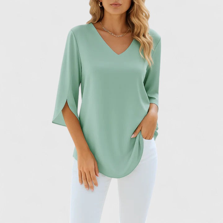 Elegant women's V-neck blouse with split sleeves. Versatile summer top for sophisticated & casual chic.