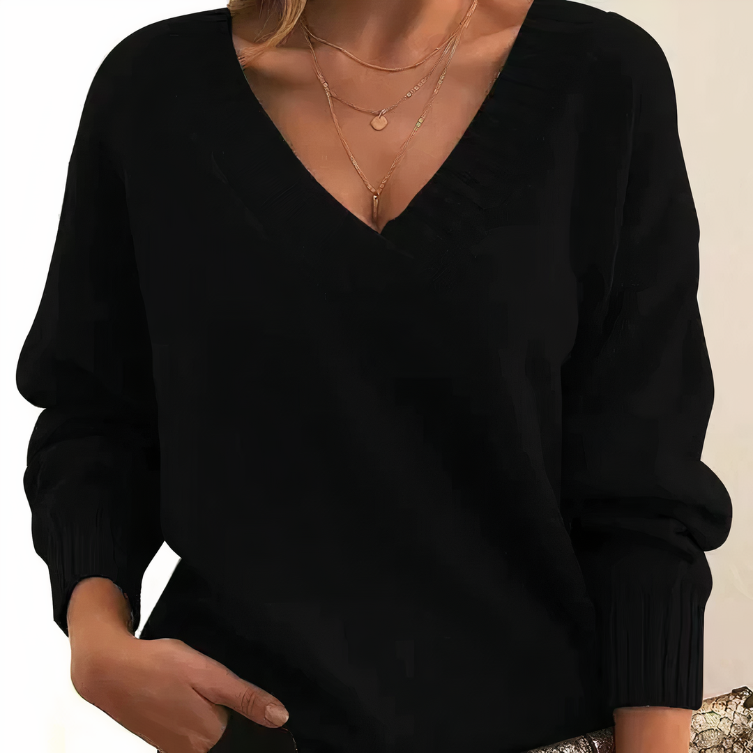 Women's elegant V-neck cashmere sweater, long sleeve, perfect cozy top for fall & winter fashion.