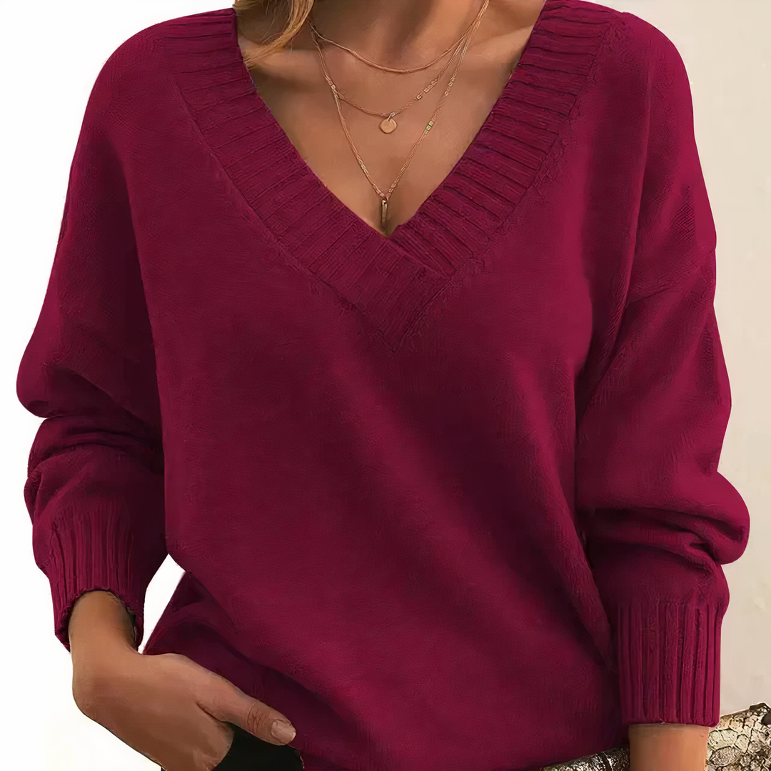 Premium women's V-neck cashmere sweater, soft and elegant long-sleeve top, perfect for winter warmth.