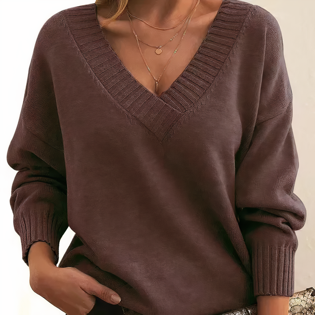 Luxurious ladies V-neck cashmere sweater, cozy and stylish long-sleeve top for cold weather outfits.