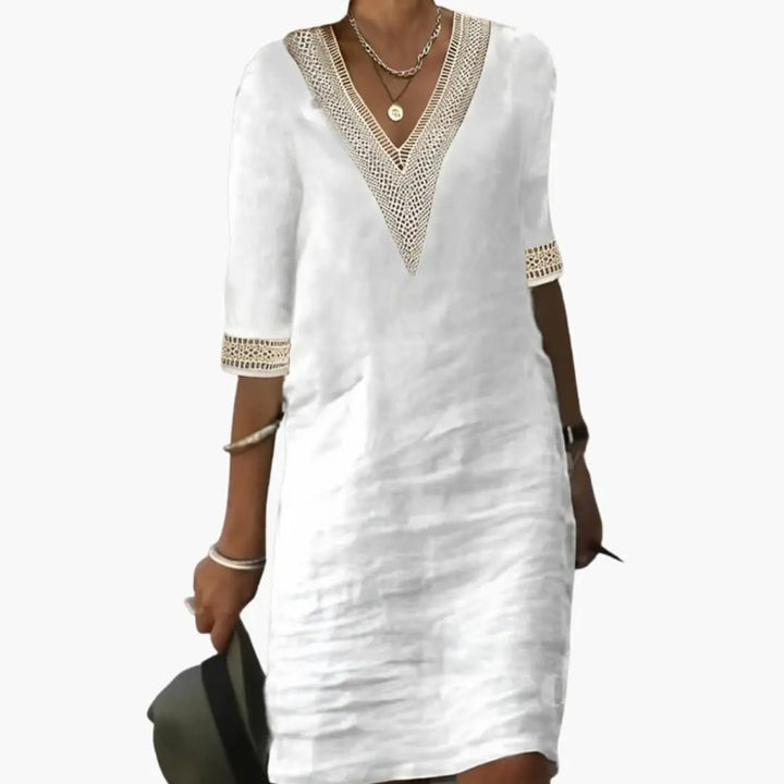 Women's elegant V-neck casual shift dress, midi length, perfect for summer vacations or everyday wear.