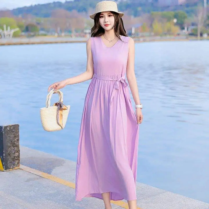 Comfortable women's V-neck maxi dress, sleeveless, with a stylish tie waist & practical pockets for everyday.