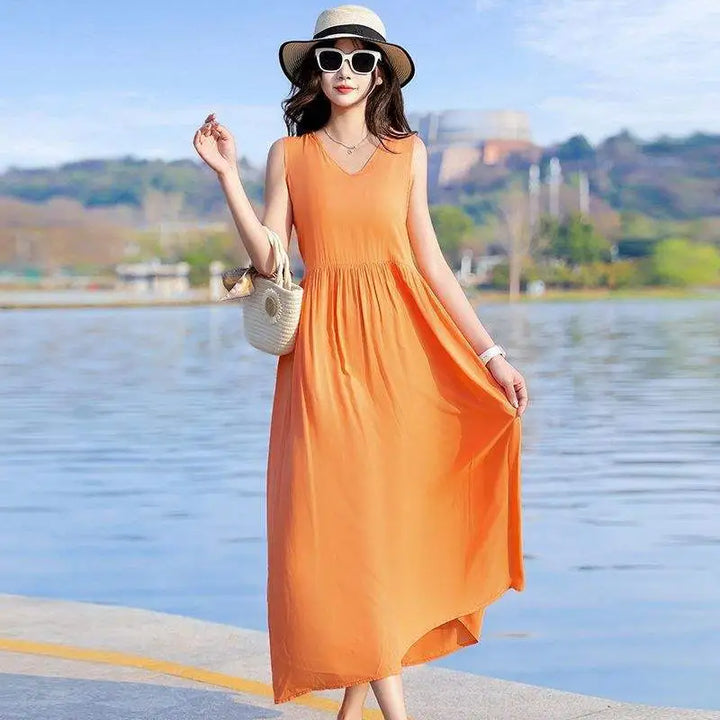 Elegant women's V-neck maxi dress with a flattering tie waist, sleeveless design & essential pockets.
