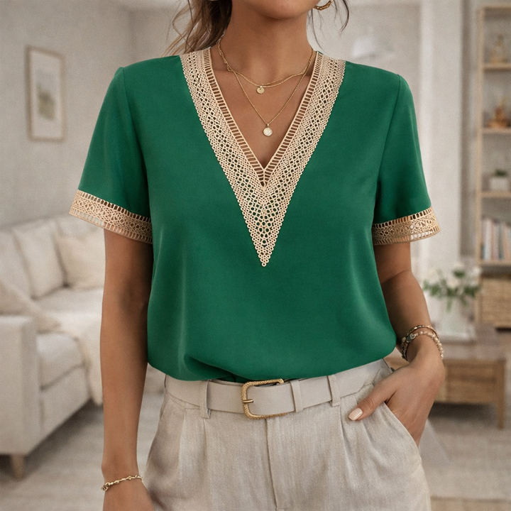Chic women's V-neck top with delicate lace trim. A comfortable & stylish blouse for spring and summer.