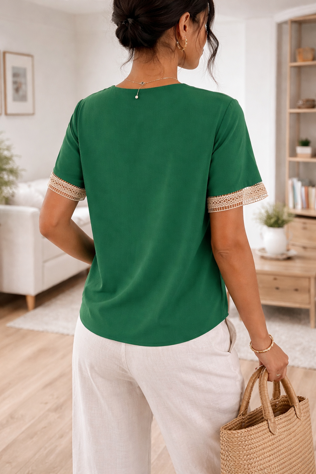 Elegant women's V-neck top featuring refined lace trim, offering effortless style for any occasion.