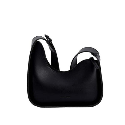 Stylish women's wave design PU leather handbag, perfect for versatile fashion.