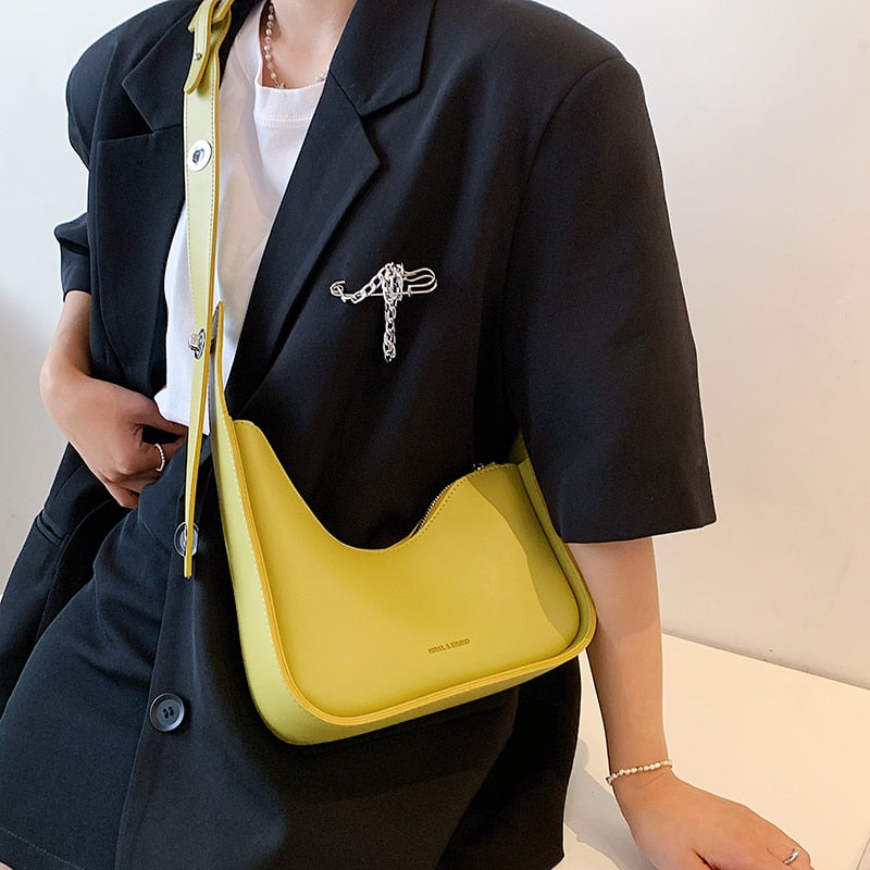 Elegant women's wave design shoulder bag, a chic and versatile accessory for any outfit.