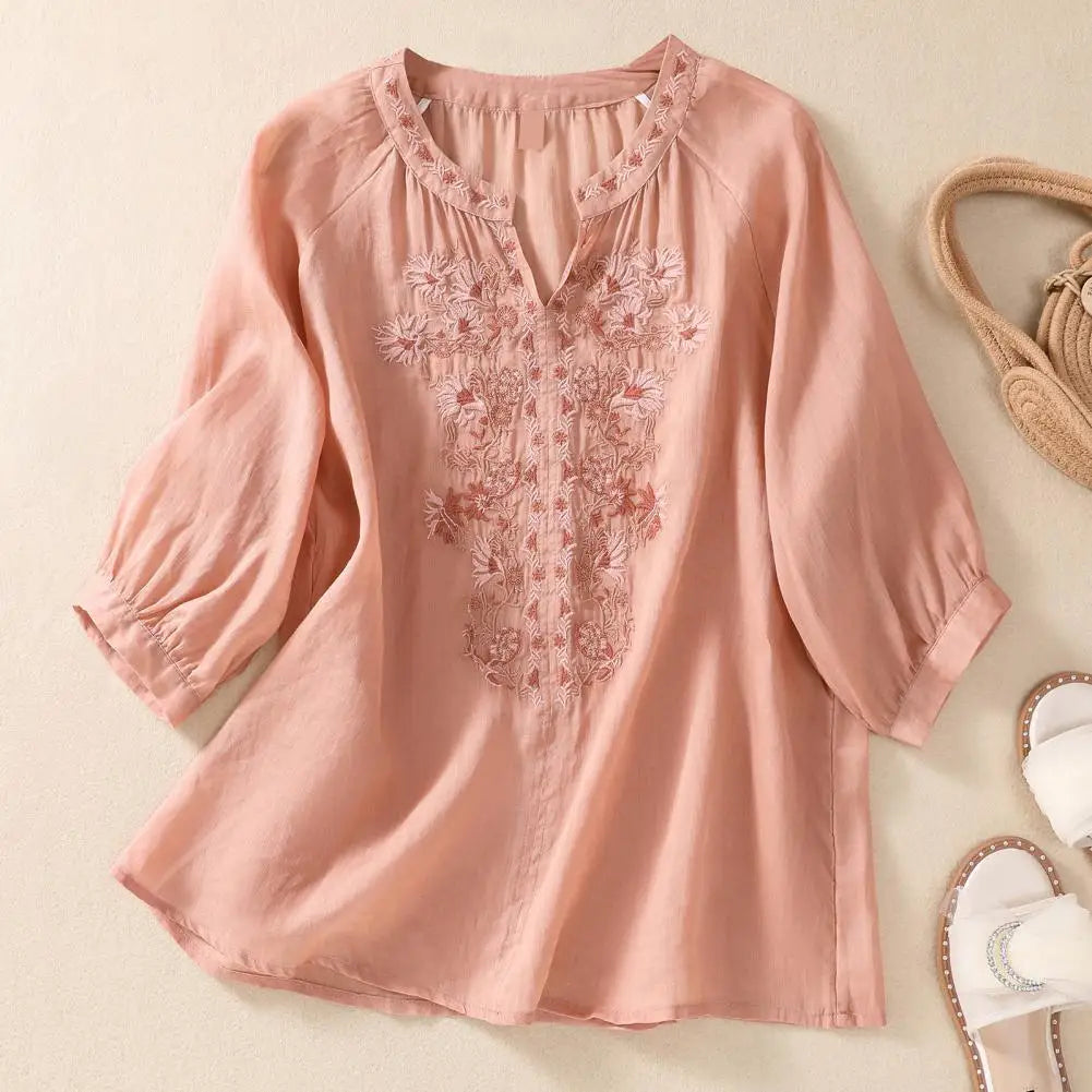 Spring/summer white floral embroidered women's blouse, comfortable and stylish with gathered cuffs.