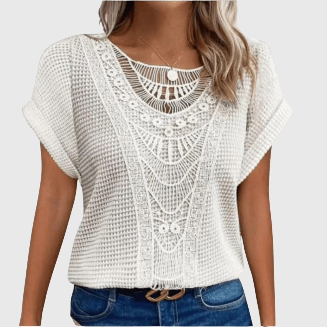 Elegant women's lace top, Ibiza style, a versatile summer blouse for casual chic resort wear.